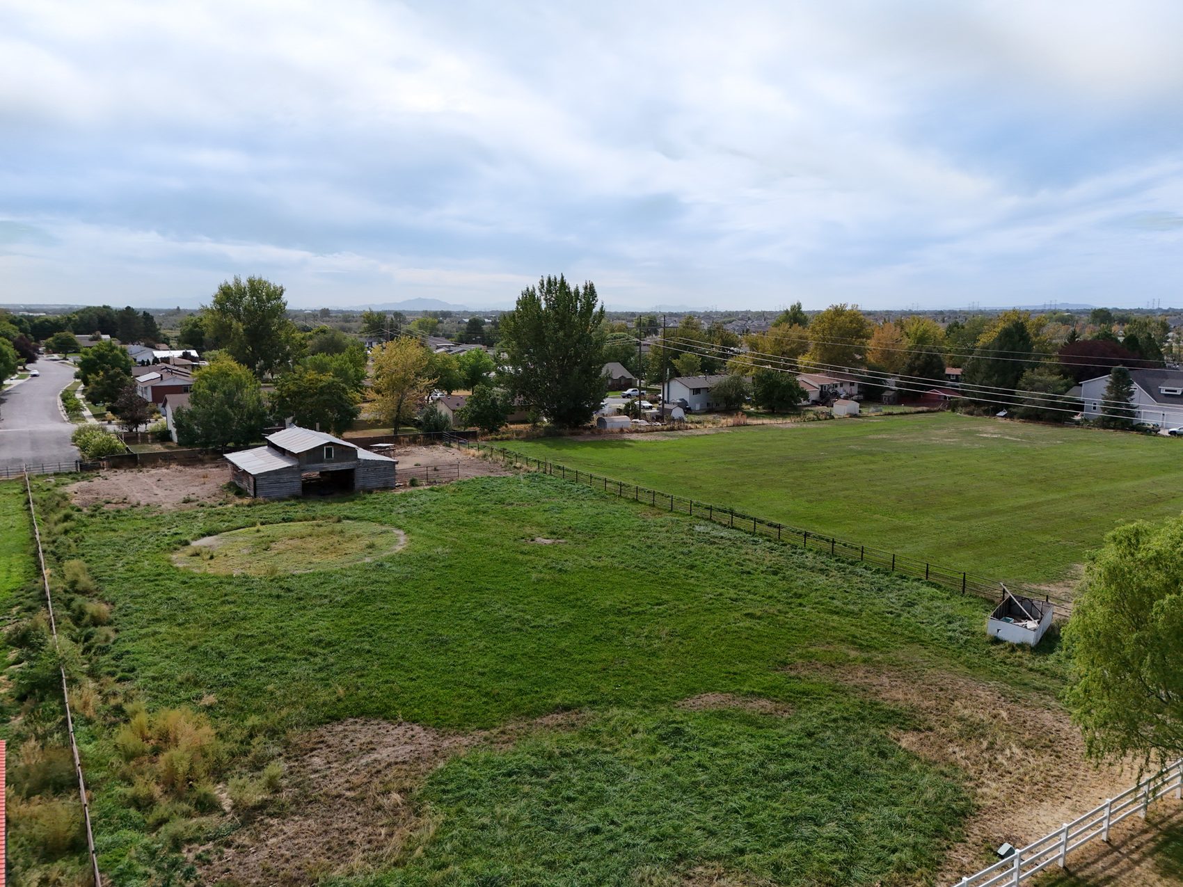 Aerial view of the 1.66-acre parcel at 2129 W 2700 N, Farr West