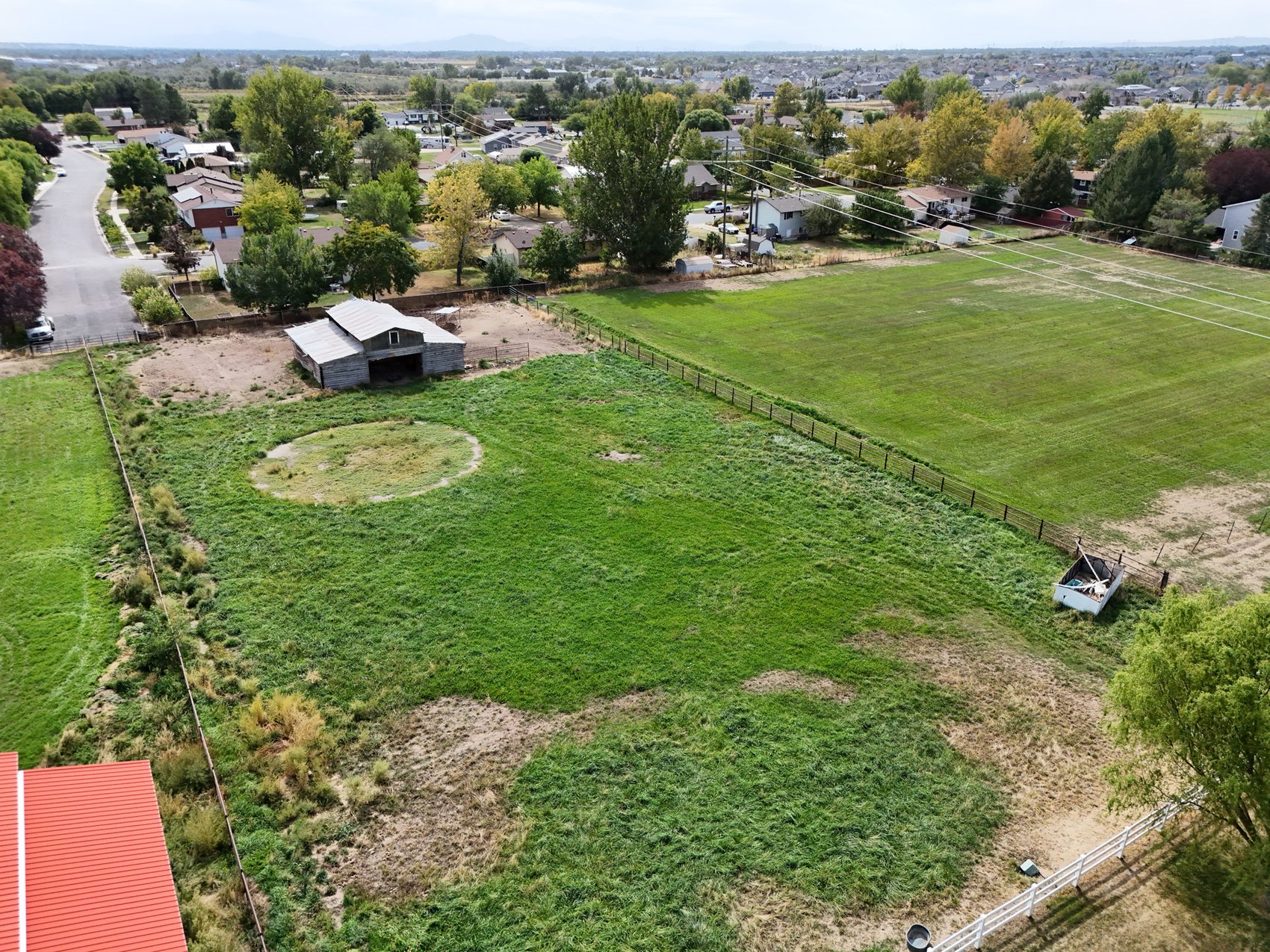 Aerial view of the 1.66-acre parcel at 2129 W 2700 N, Farr West
