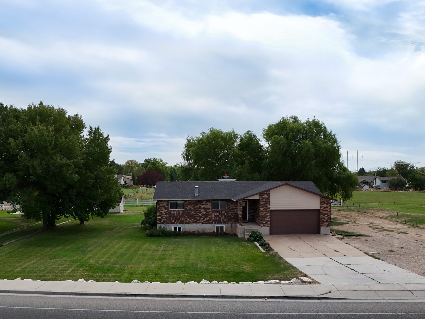 Aerial view of the 1.66-acre parcel at 2129 W 2700 N, Farr West