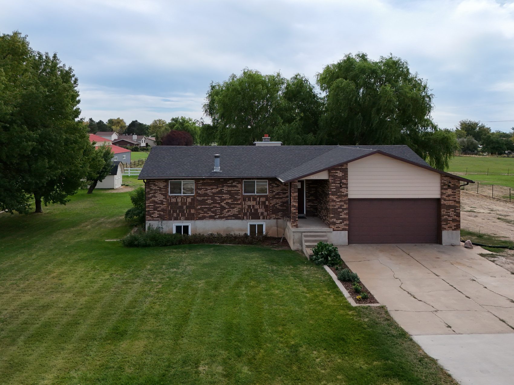 Aerial view of the 1.66-acre parcel at 2129 W 2700 N, Farr West
