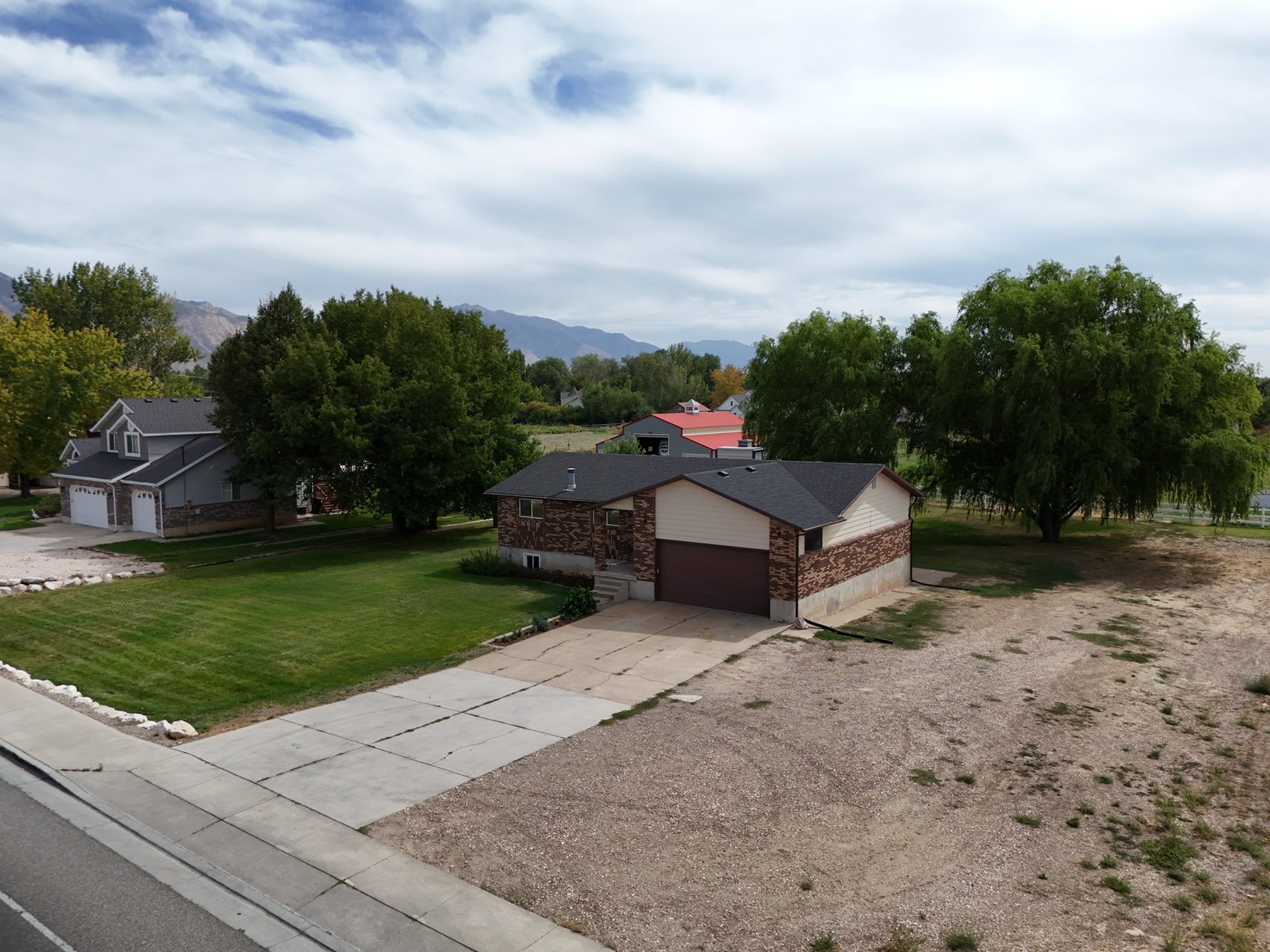 Aerial view of the 1.66-acre parcel at 2129 W 2700 N, Farr West