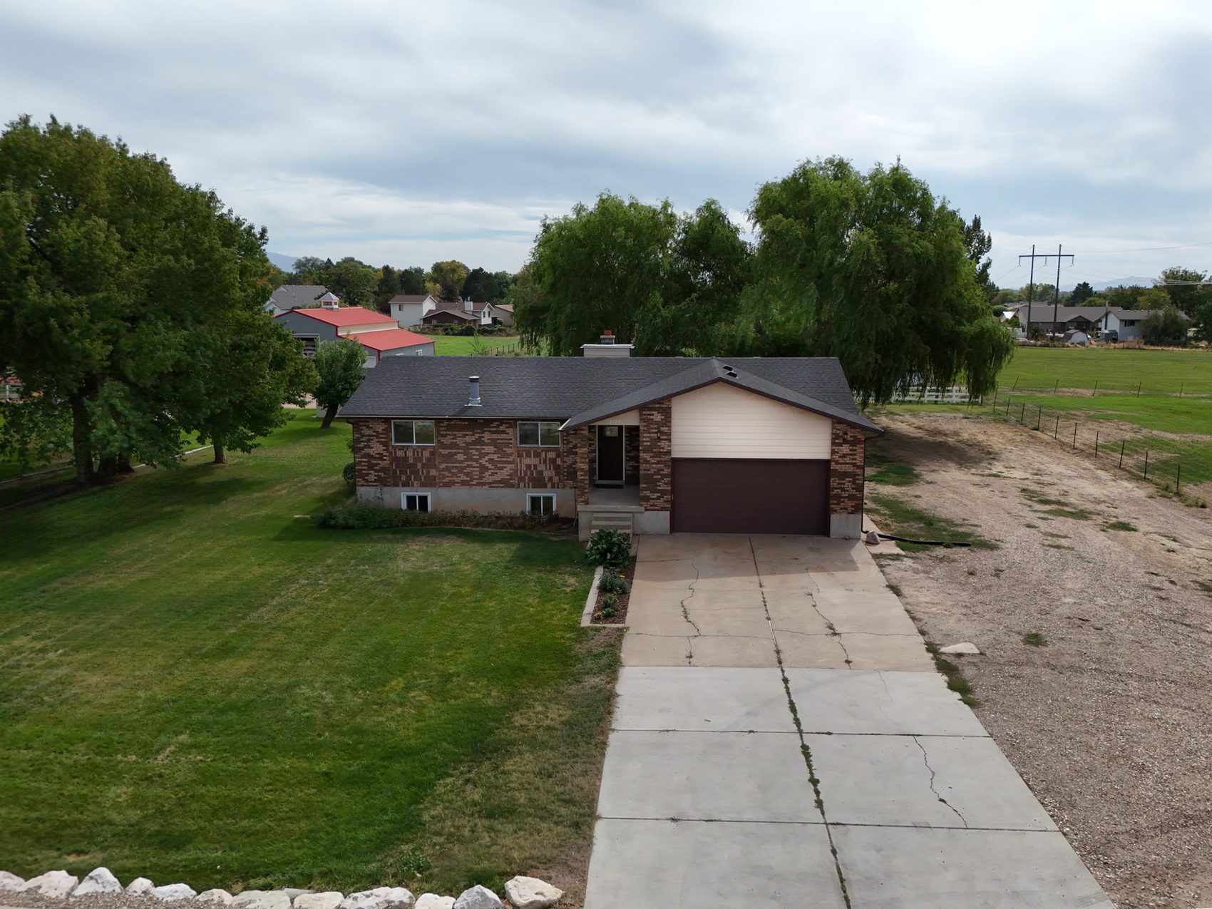 Aerial view of the 1.66-acre parcel at 2129 W 2700 N, Farr West